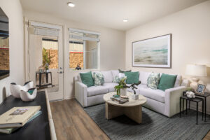 modern living room with sectional couch and patio door