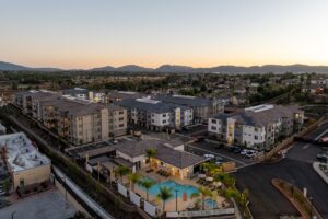aerial view of Delhaven Pointe buildings at sunset